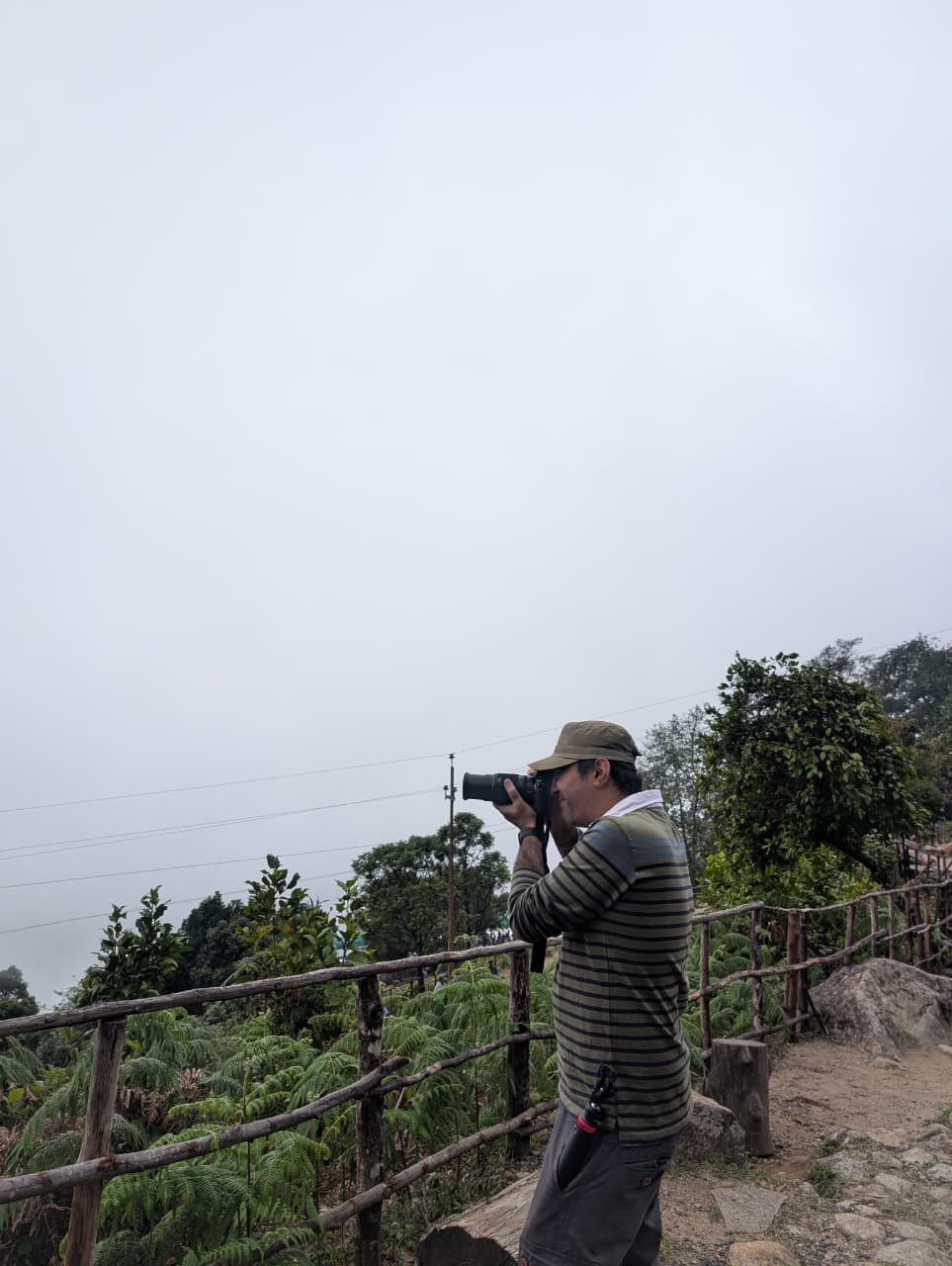 Prashant S Gupta wildlife photographer with Nikon camera at Eravikulam National Park Munnar Kerala