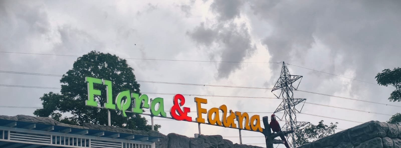 Flora and Fauna park entrance sign on the Kochi to Munnar highway Kerala