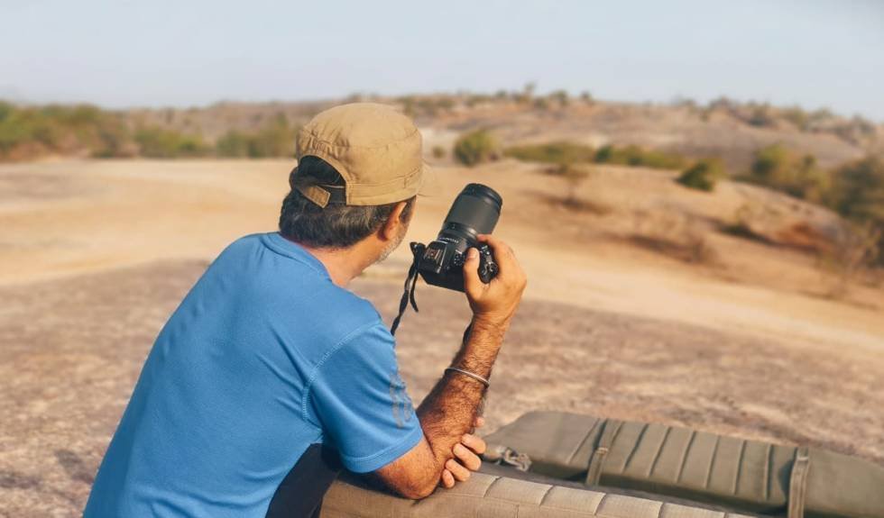 Prashant S. Gupta photographing wildlife from a safari jeep in Jawai