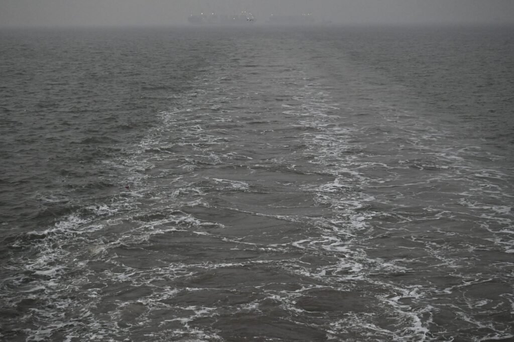 The ferry wake on the way across to Alibaug